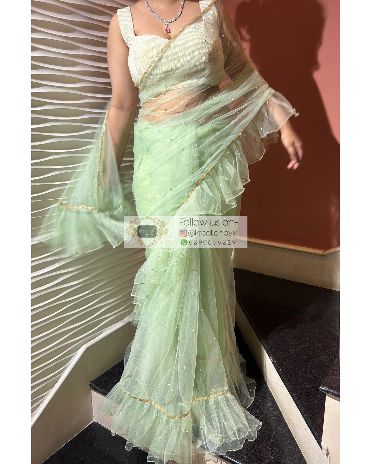 Soft Mint Green Ruffle Net Saree