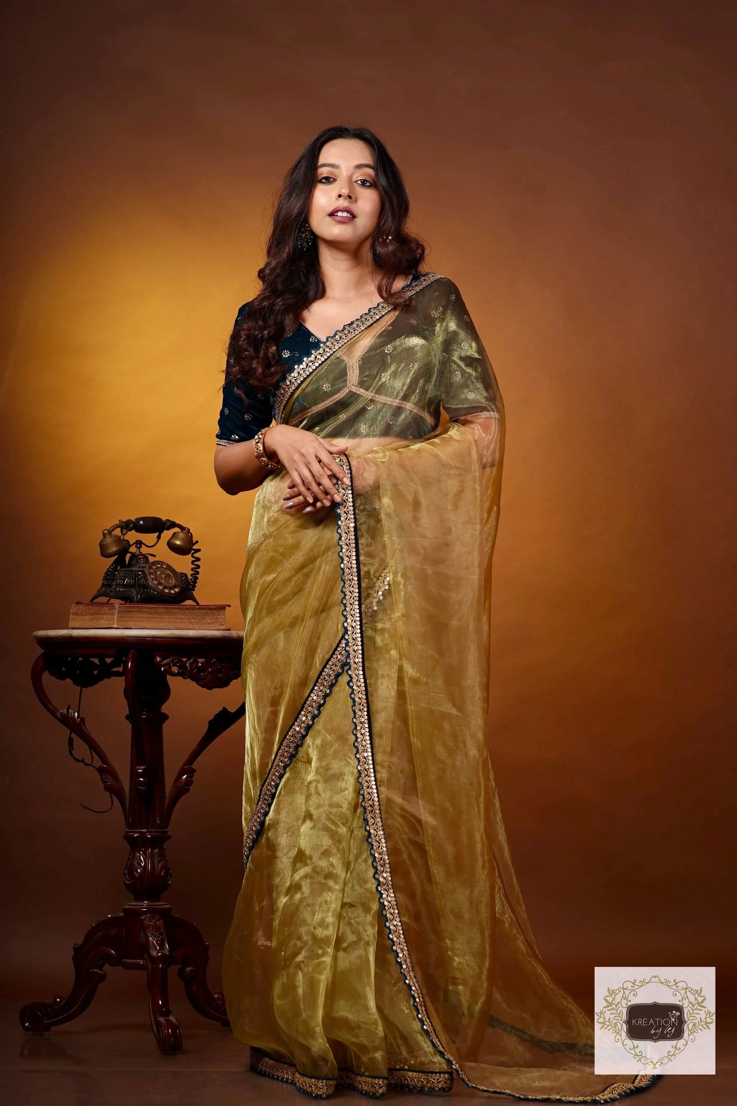Pista Green Glass Tissue Saree with Teal Border kreationbykj