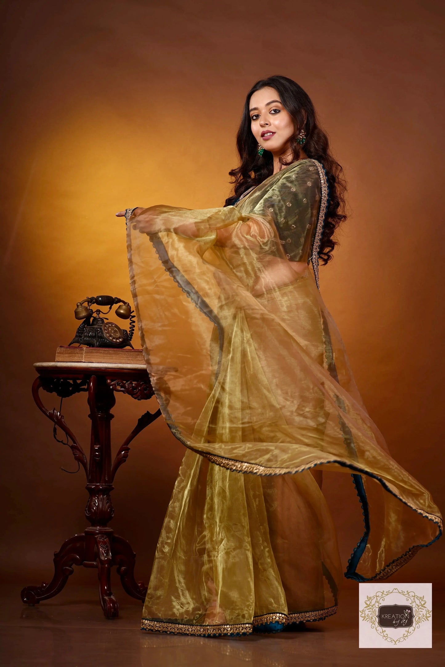 Pista Green Glass Tissue Saree with Teal Border kreationbykj
