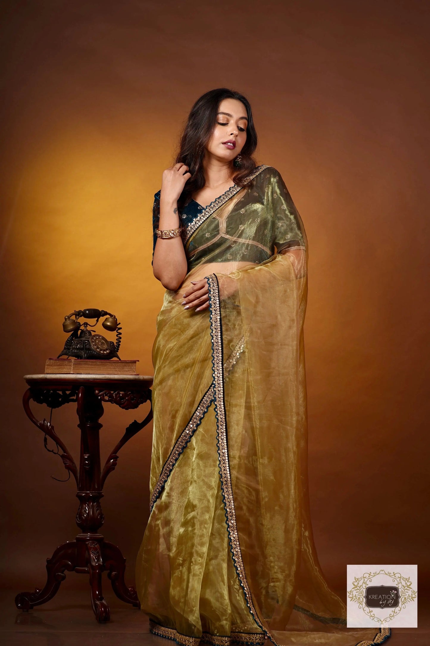 Pista Green Glass Tissue Saree with Teal Border kreationbykj