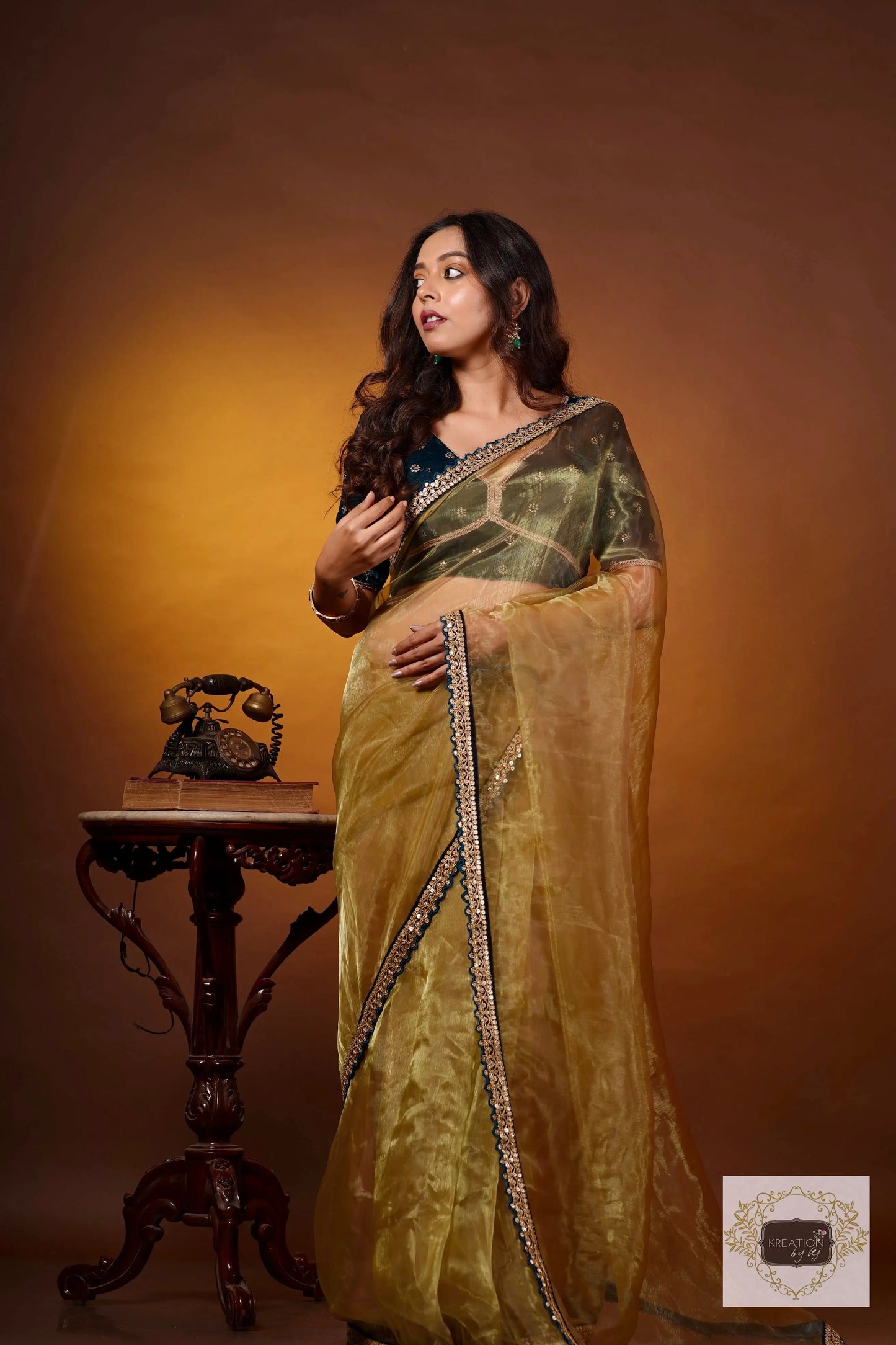 Pista Green Glass Tissue Saree with Teal Border kreationbykj