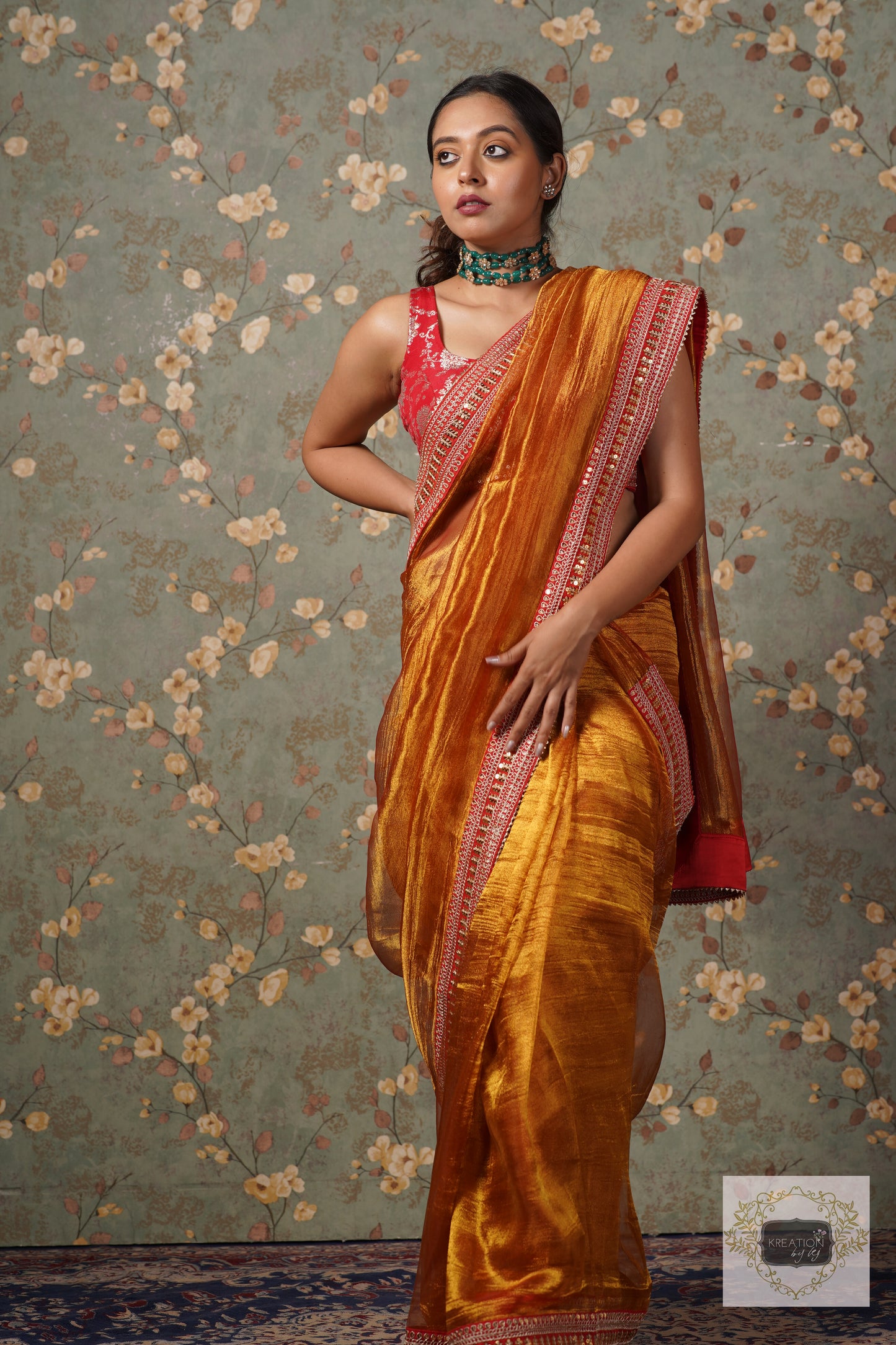 Fiery Gold Zari Tissue Saree with Red Border
