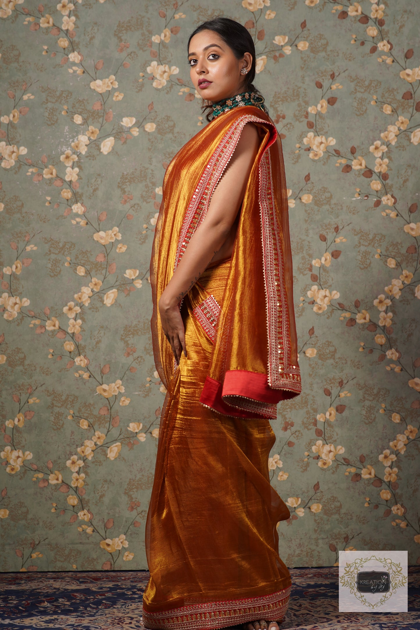 Fiery Gold Zari Tissue Saree with Red Border