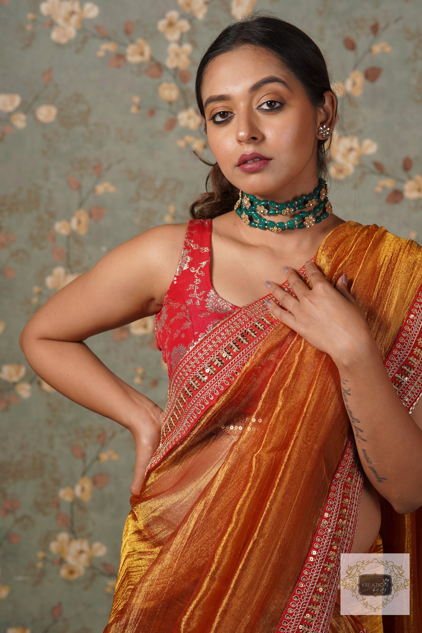 Fiery Gold Zari Tissue Saree with Red Border