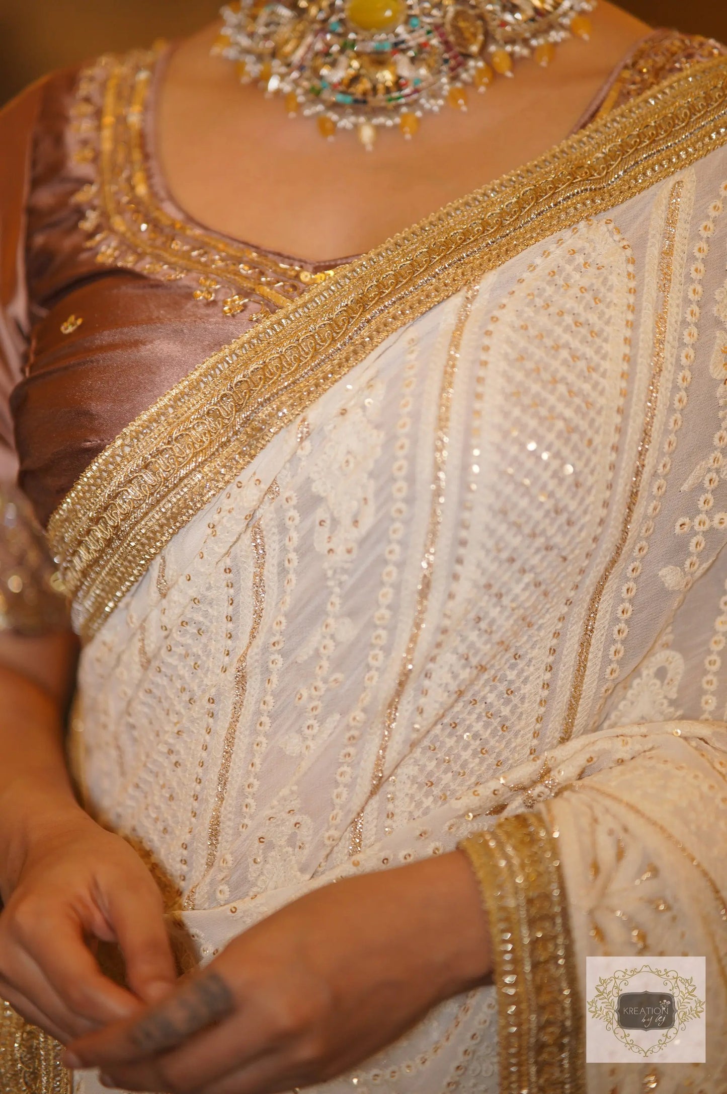 Husn Cream Georgette Embroidered Saree kreationbykj