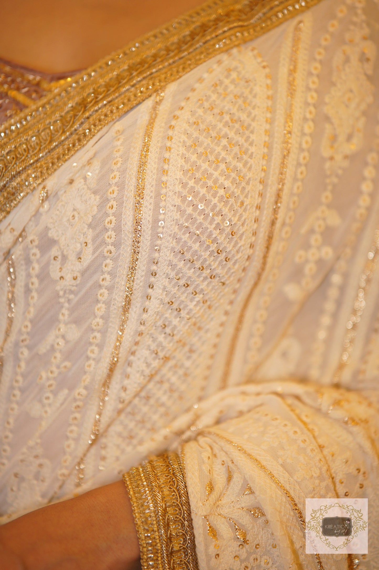 Husn Cream Georgette Embroidered Saree kreationbykj