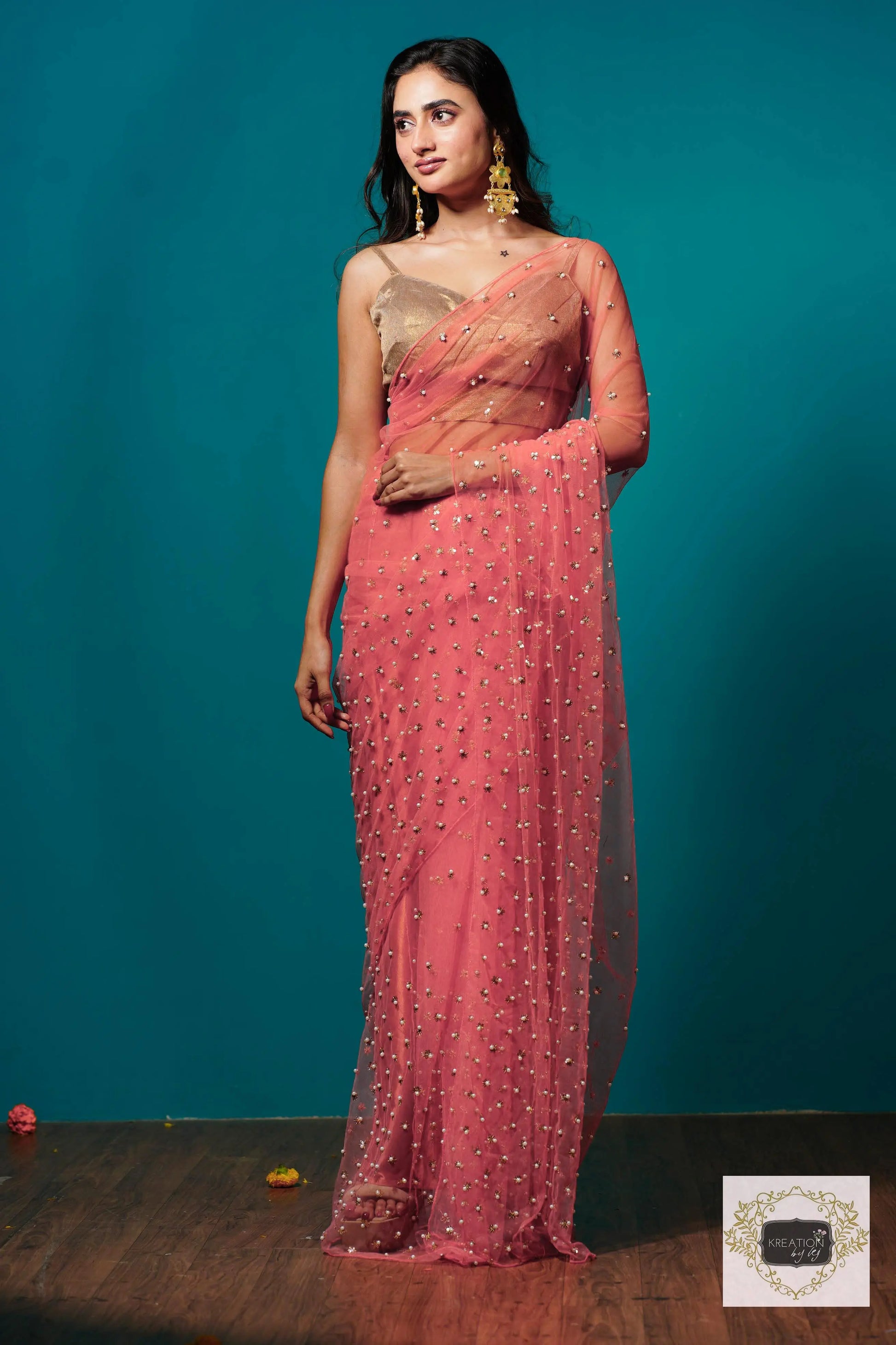 Coral jugnoo net Girlish Looking Partywear Saree kreationbykj