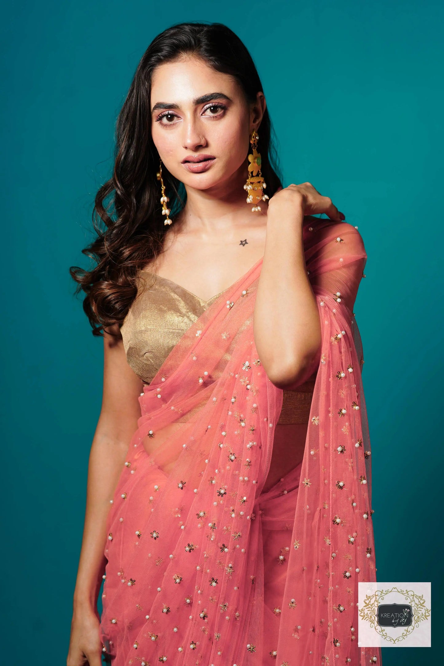 Coral jugnoo net Girlish Looking Partywear Saree kreationbykj