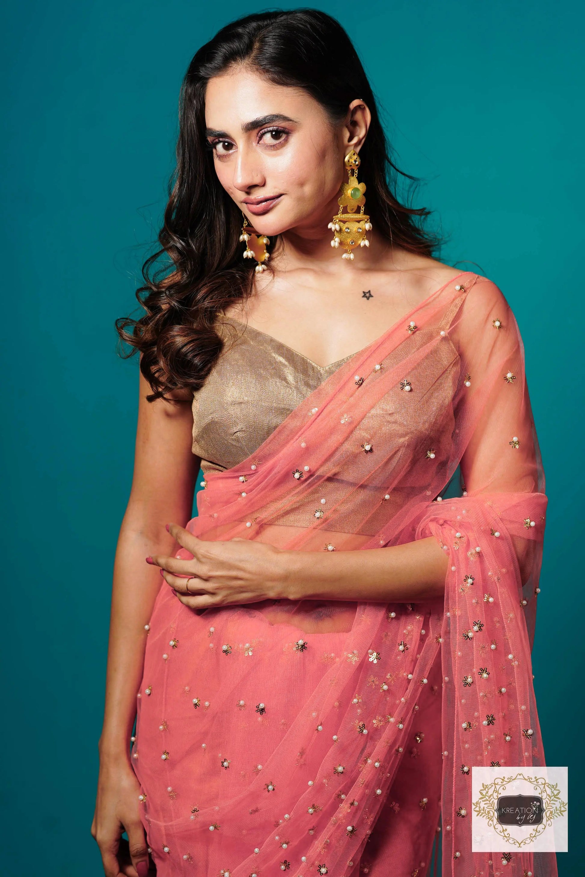 Coral jugnoo net Girlish Looking Partywear Saree kreationbykj
