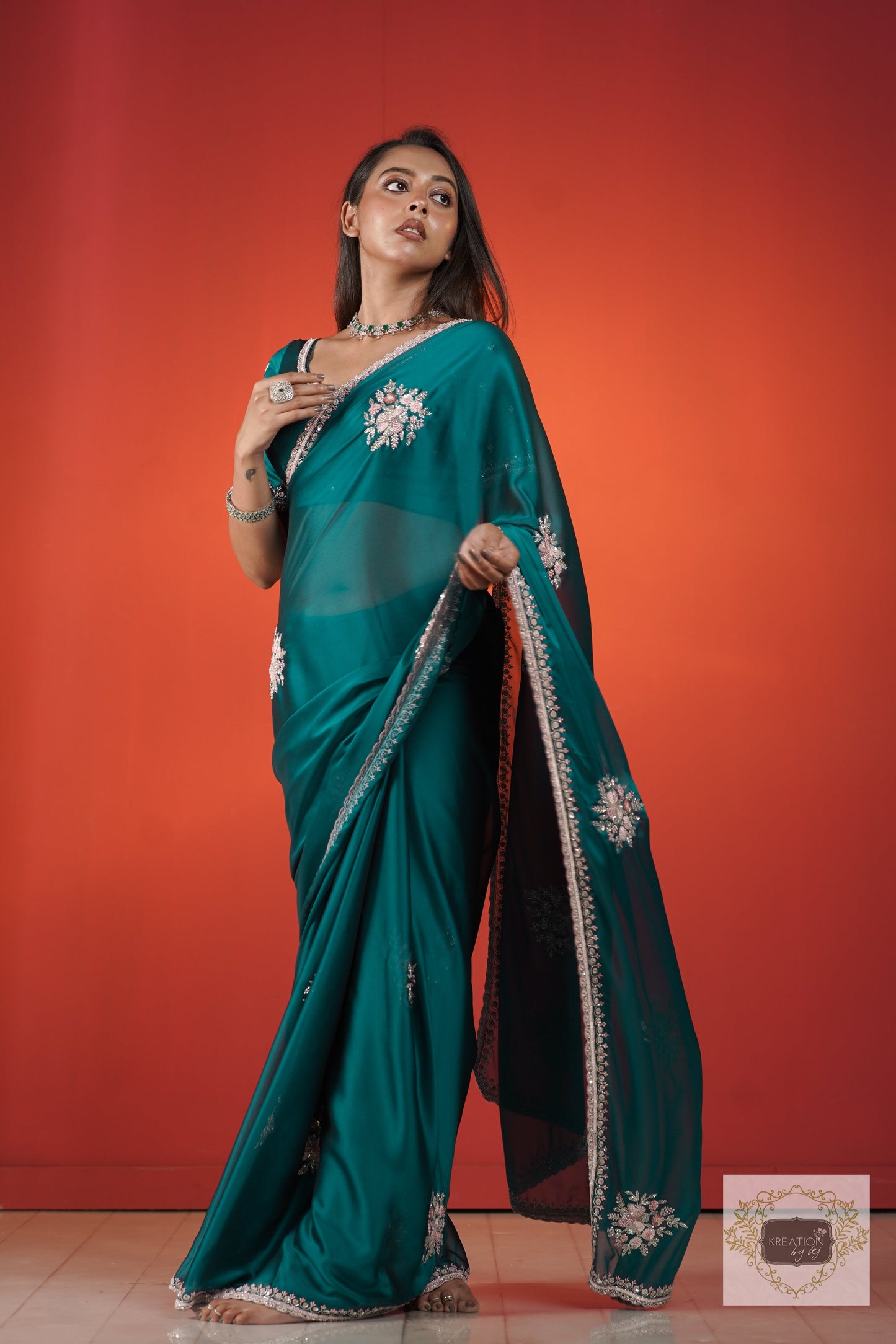 Teal Blue Floral Symphony Saree kreationbykj