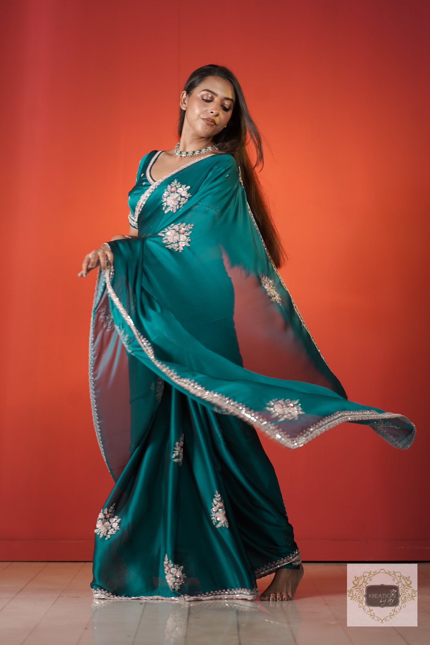 Teal Blue Floral Symphony Saree kreationbykj