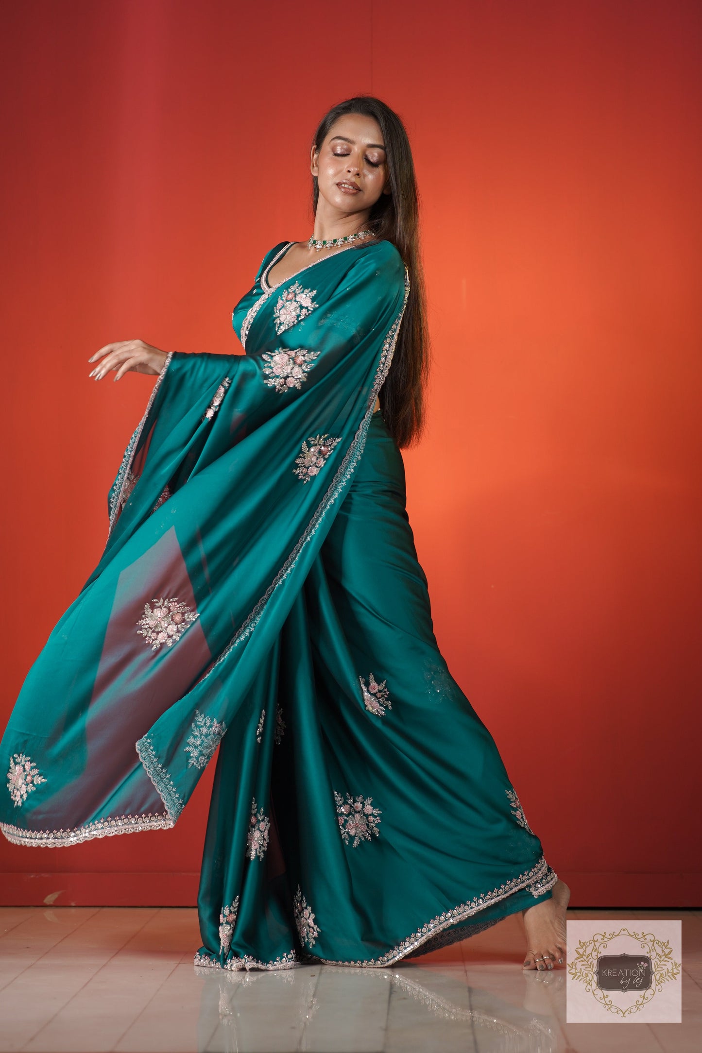 Teal Blue Floral Symphony Saree kreationbykj