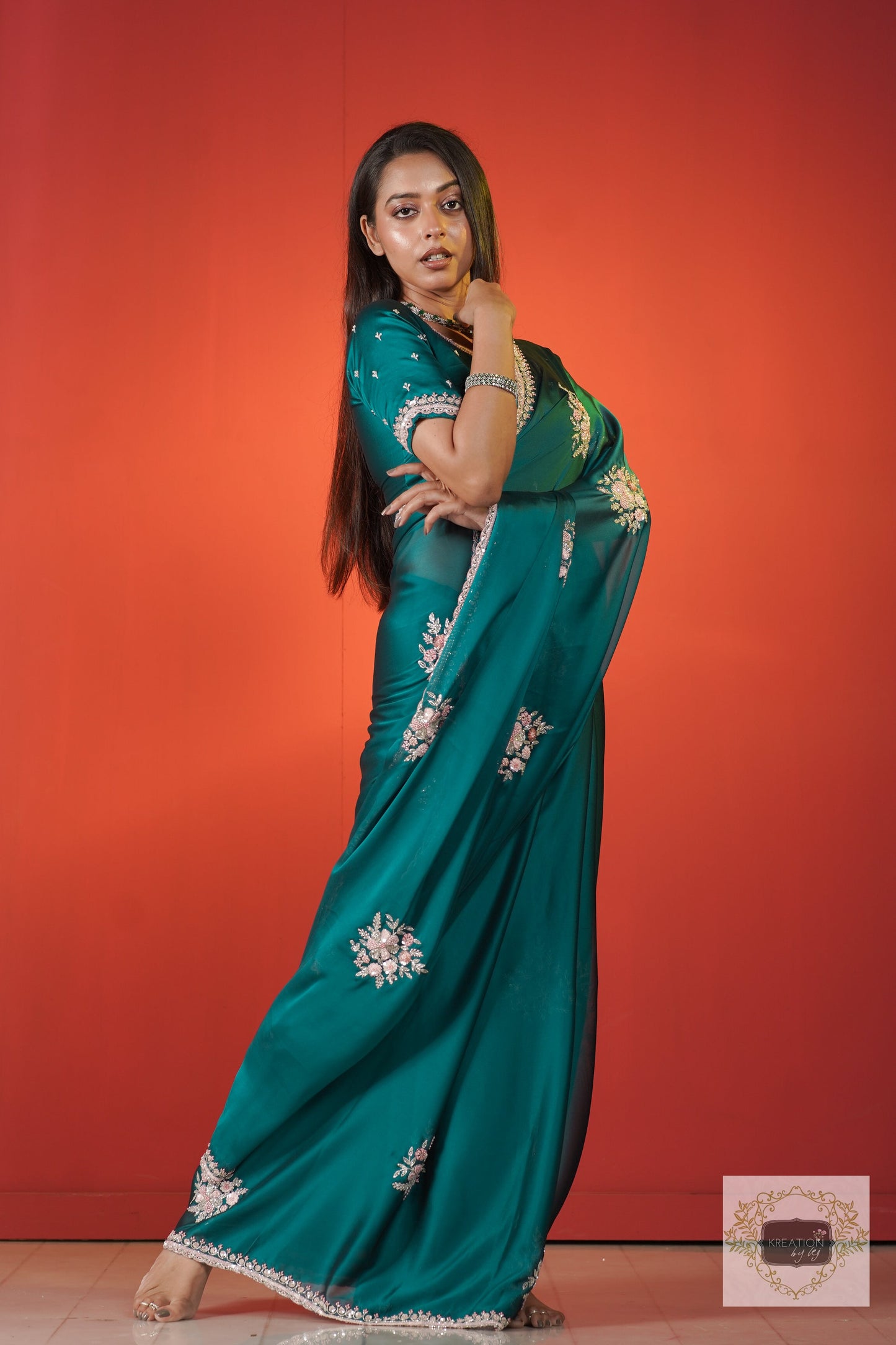 Teal Blue Floral Symphony Saree kreationbykj