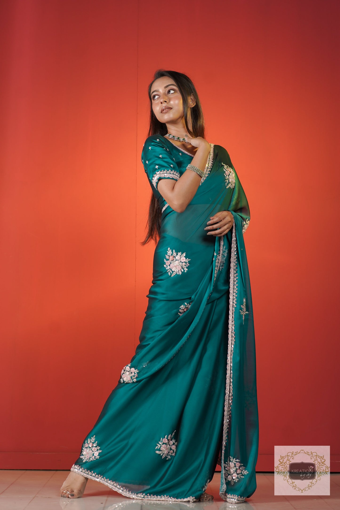 Teal Blue Floral Symphony Saree kreationbykj