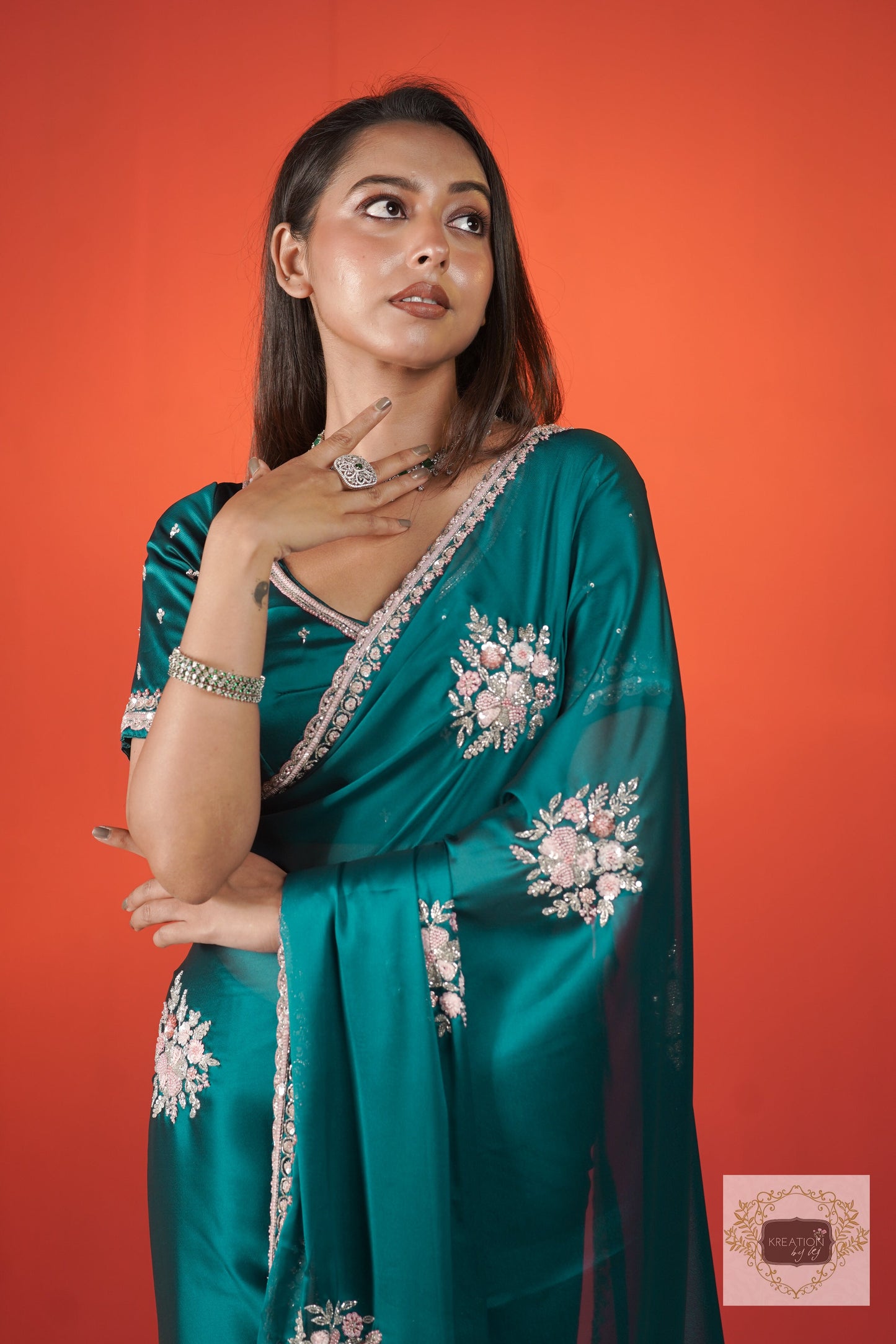 Teal Blue Floral Symphony Saree kreationbykj