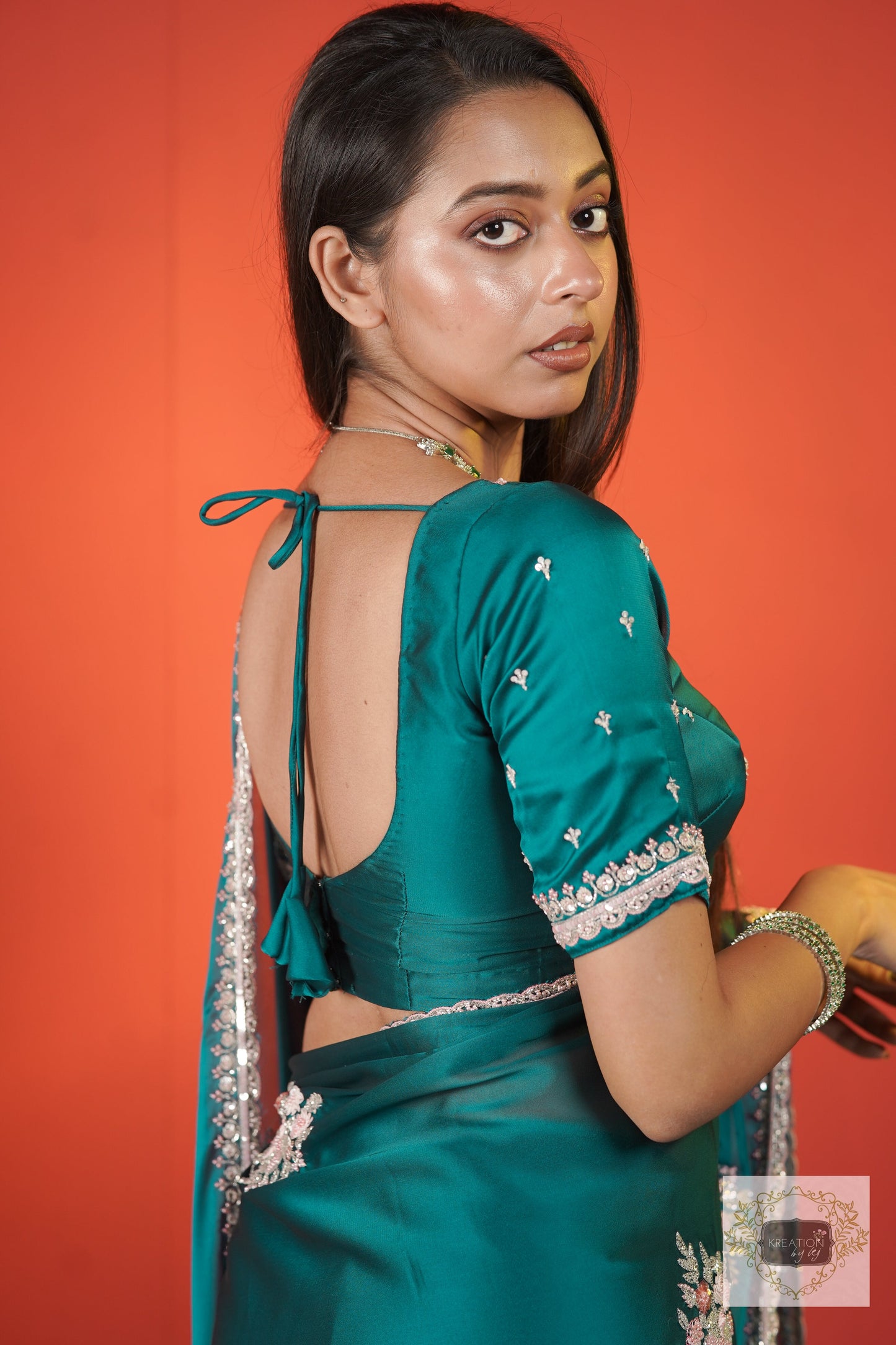 Teal Blue Floral Symphony Saree kreationbykj