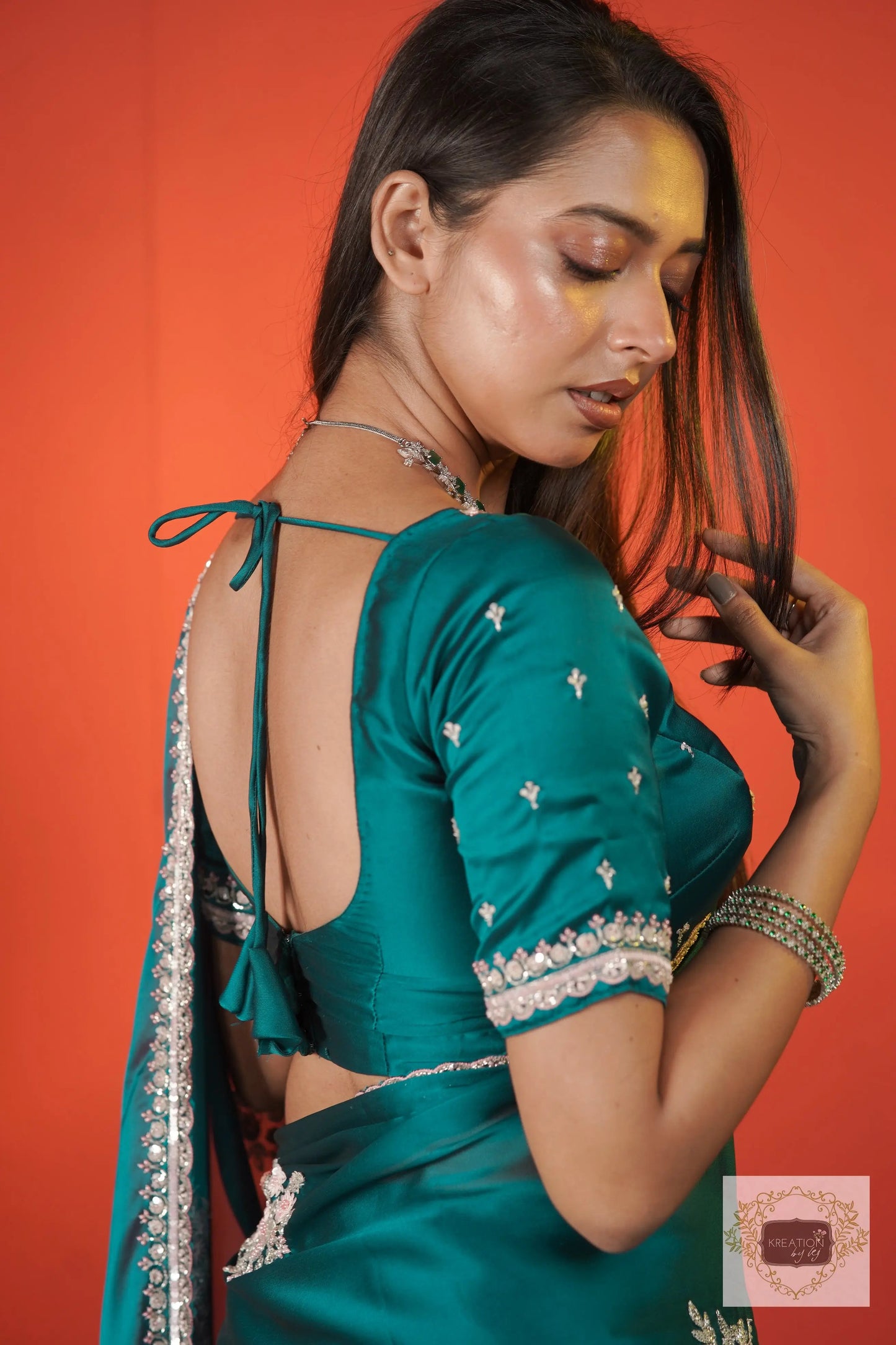 Teal Blue Floral Symphony Saree kreationbykj