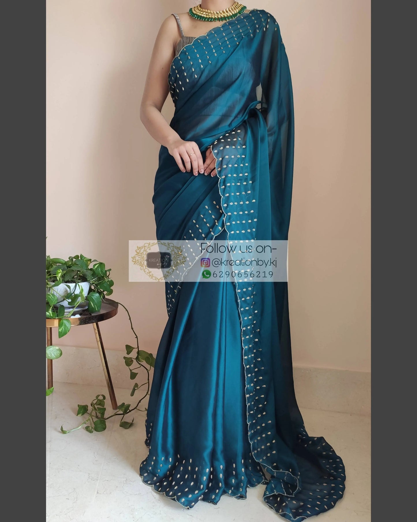 Teal Blue Georgette Silk Saree With Handembroidered Dabka Motifs On Border - kreationbykj