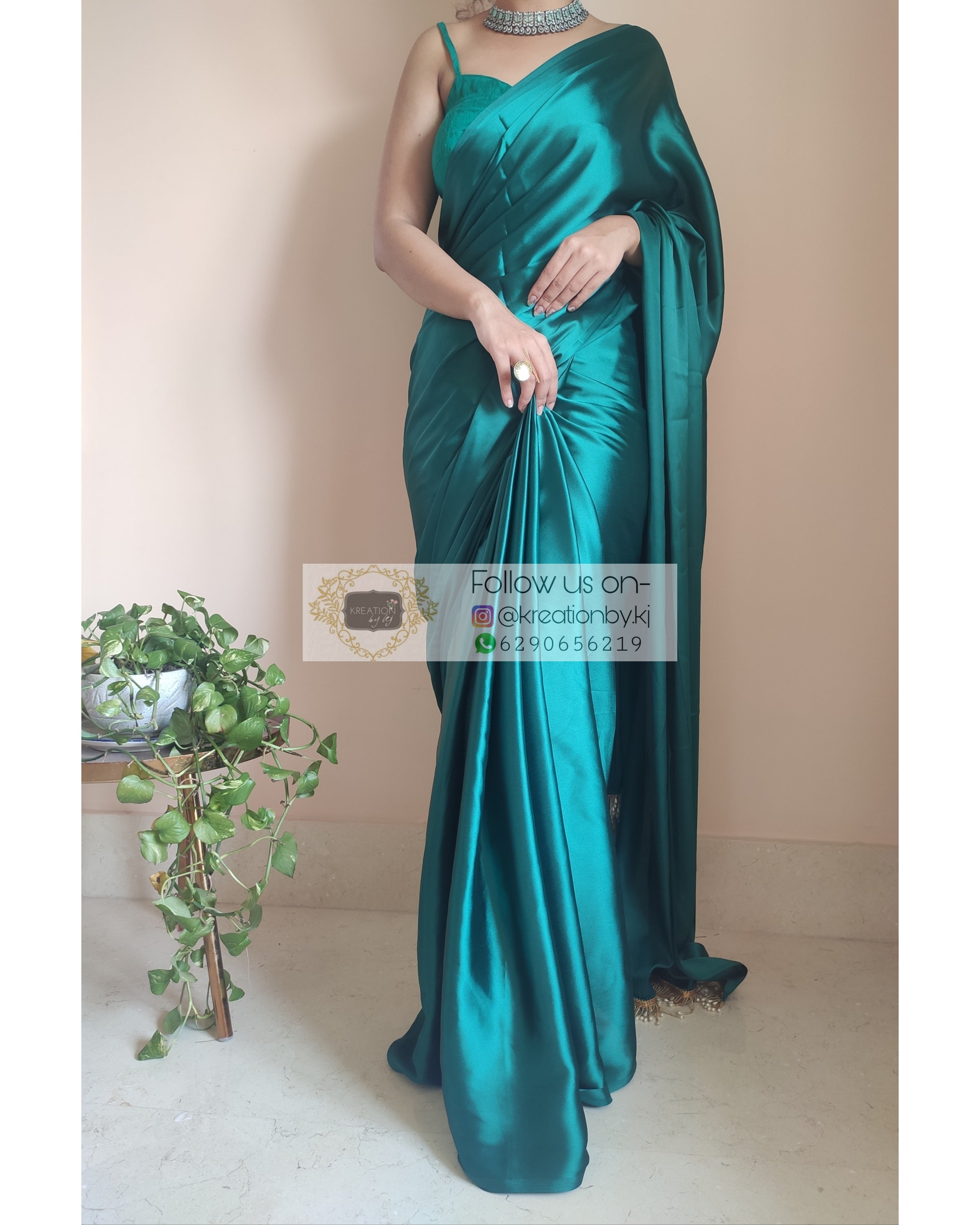 Moss Green Satin Silk Saree With Handmade Tassels On Pallu