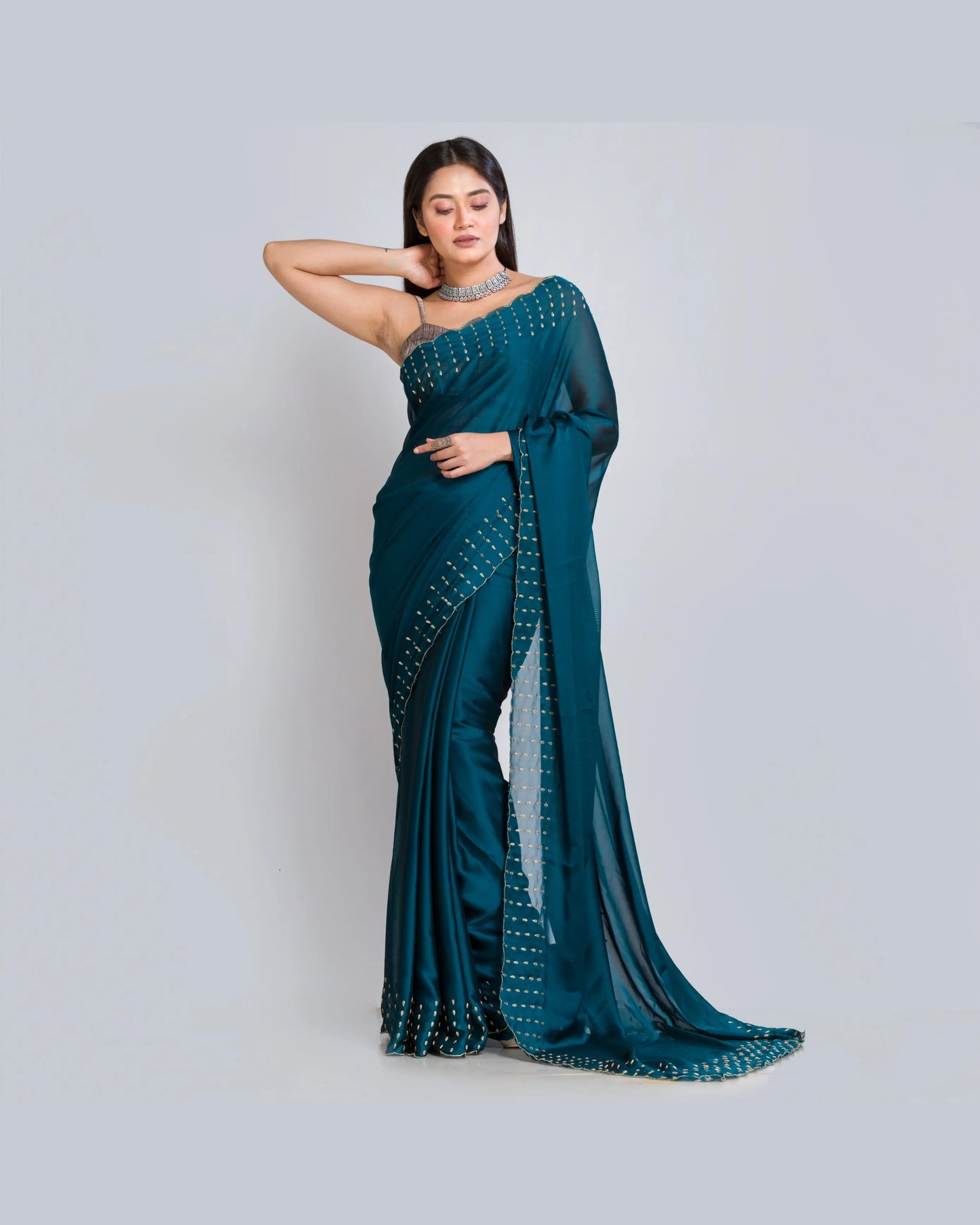 Teal Blue Georgette Silk Saree With Handembroidered Dabka Motifs On Border - kreationbykj