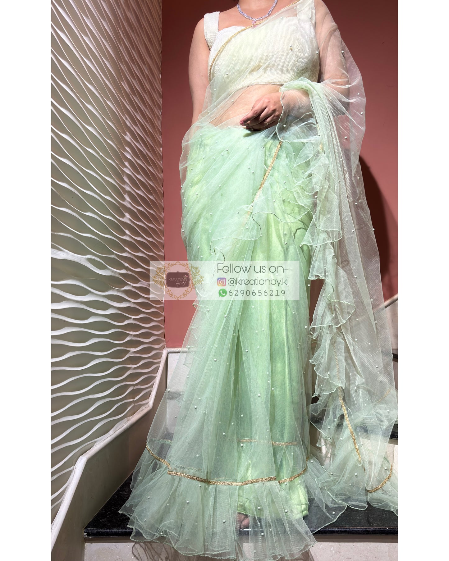 Soft Mint Green Ruffle Net Saree