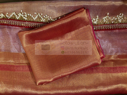 Dusty Pink Tissue Saree with Hand made Tassels in Pallu