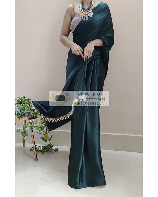 Dark Blackish Green Satin Silk Saree With Handmade Tassels On Pallu