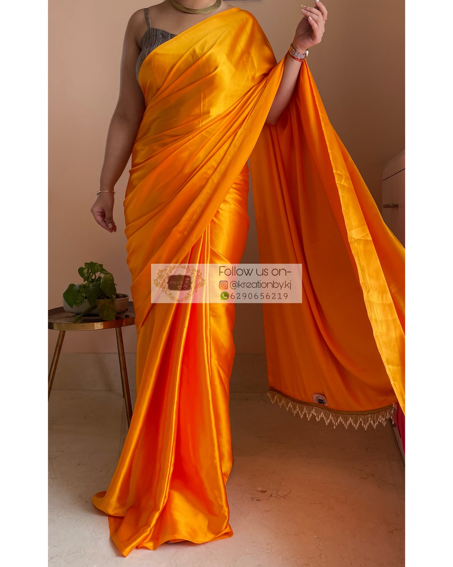 Saffron Satin Silk Saree with Handmade Tassels on Pallu