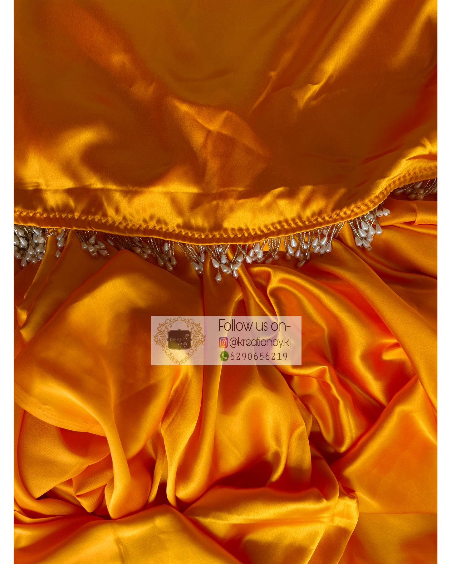 Saffron Satin Silk Saree with Handmade Tassels on Pallu