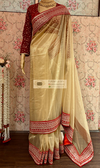 Beige Tissue Net Saree with Red Border