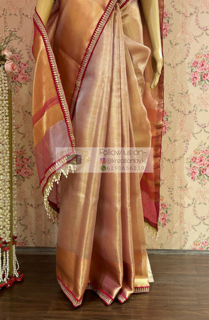 Dusty Pink Tissue Saree with Hand made Tassels in Pallu