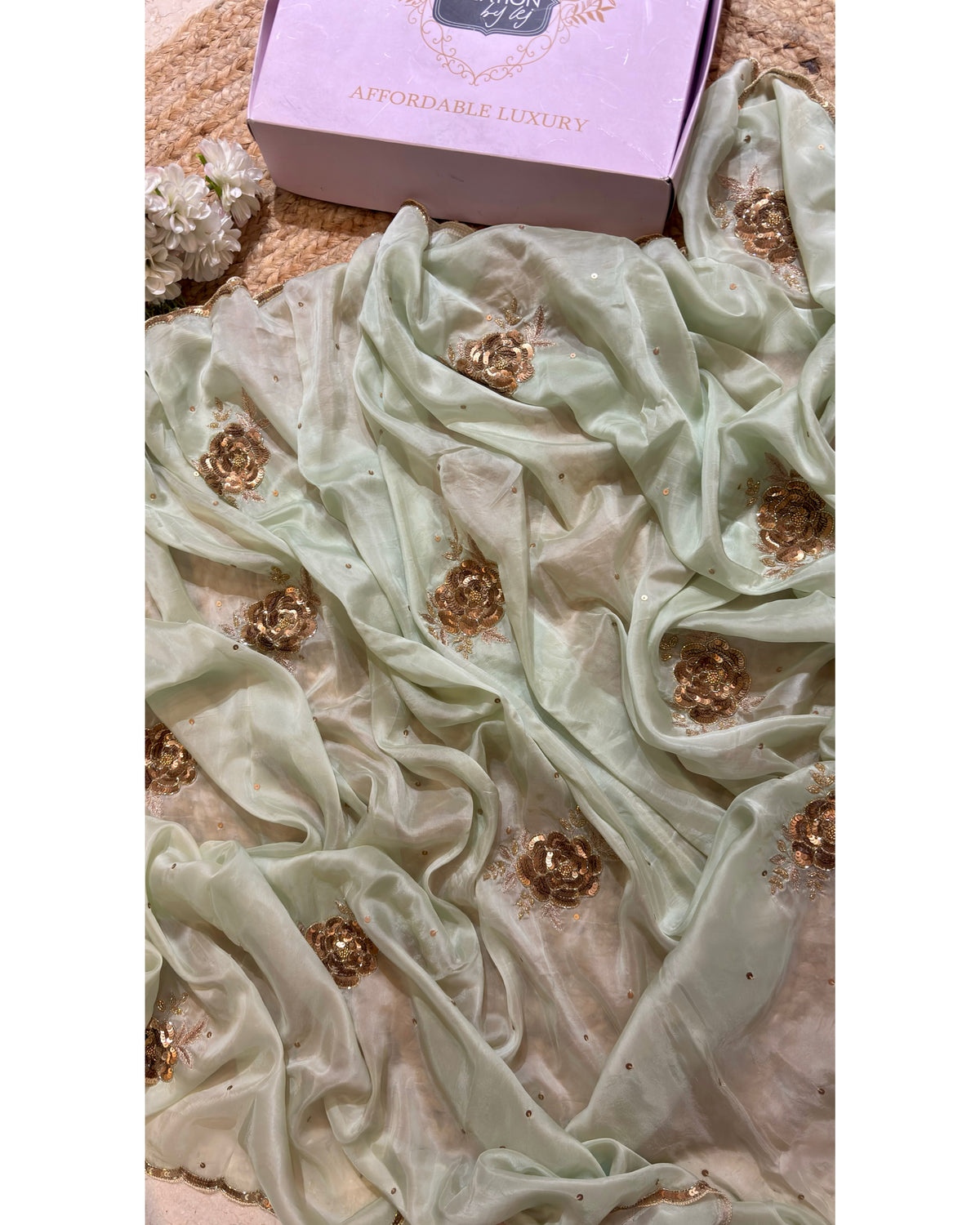 A Moment in Rose In Mint Green Organza Saree