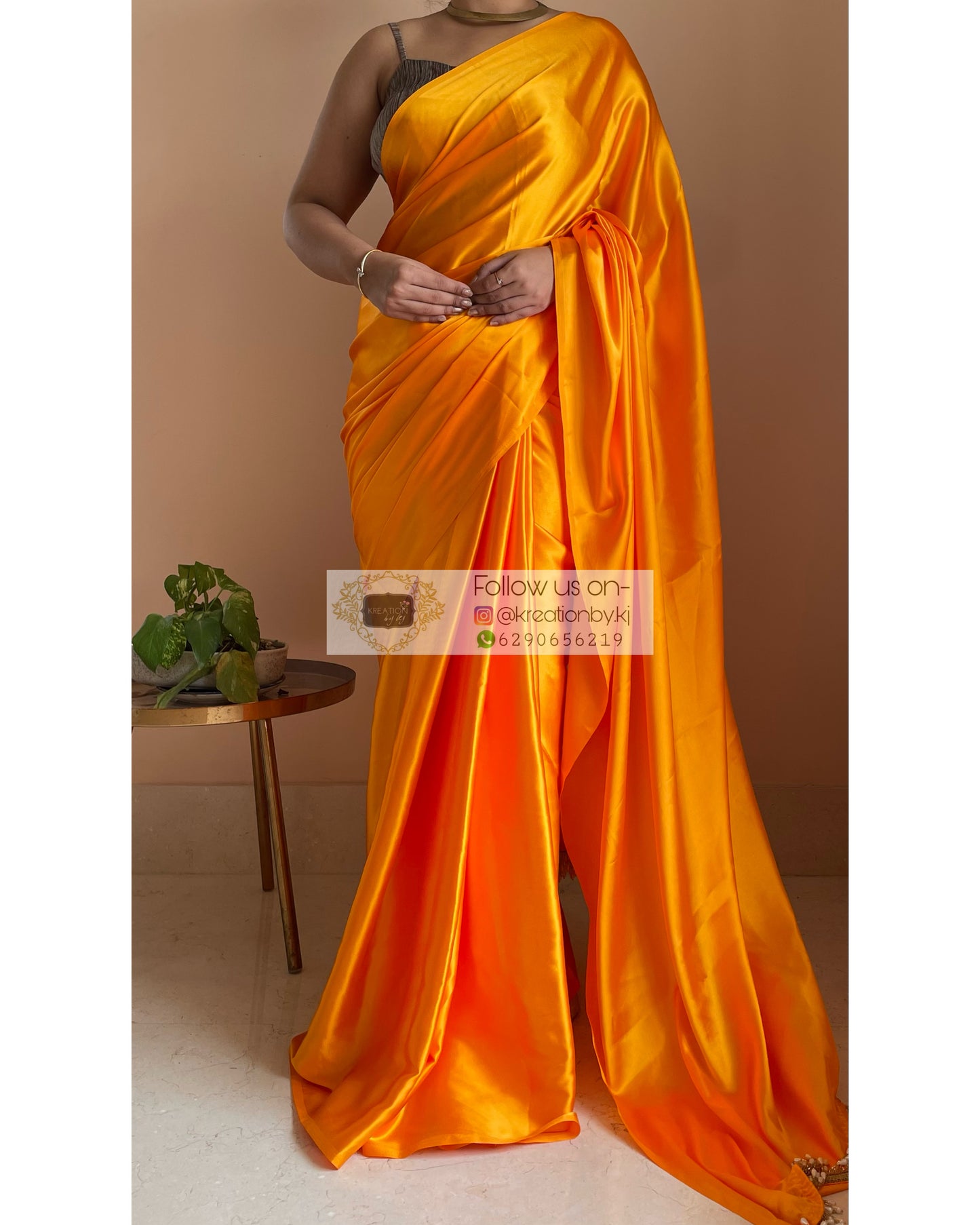 Saffron Satin Silk Saree with Handmade Tassels on Pallu