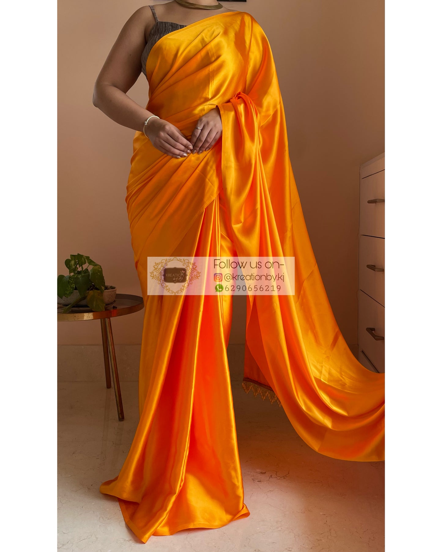 Saffron Satin Silk Saree with Handmade Tassels on Pallu