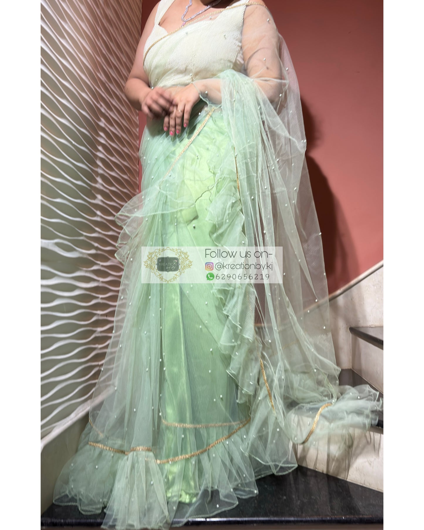 Soft Mint Green Ruffle Net Saree