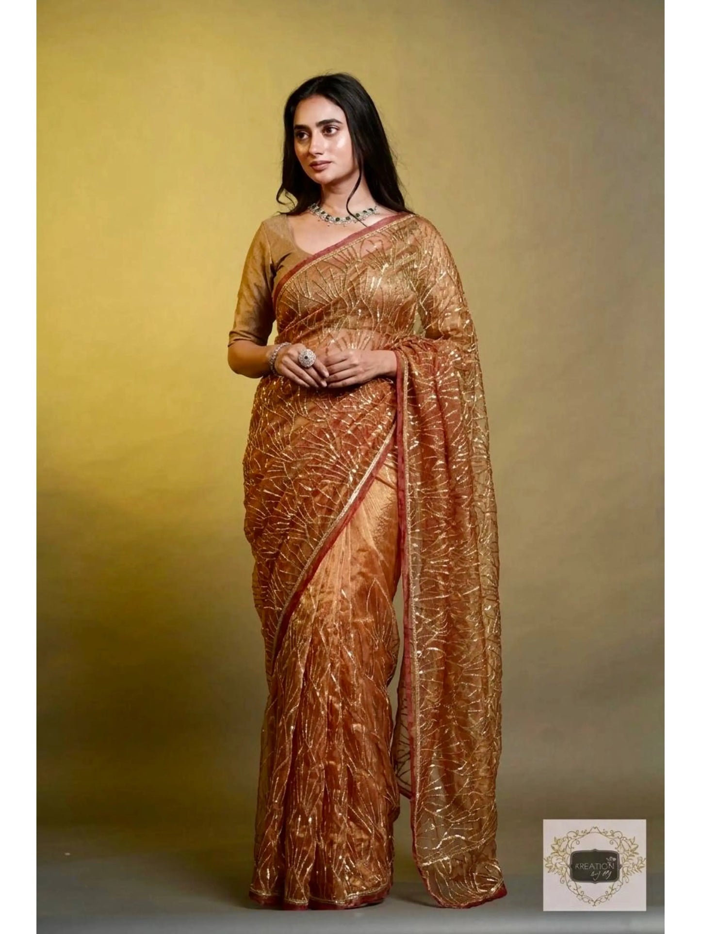 Liquid Gold A Sky full of Stars Saree For Reception kreationbykj
