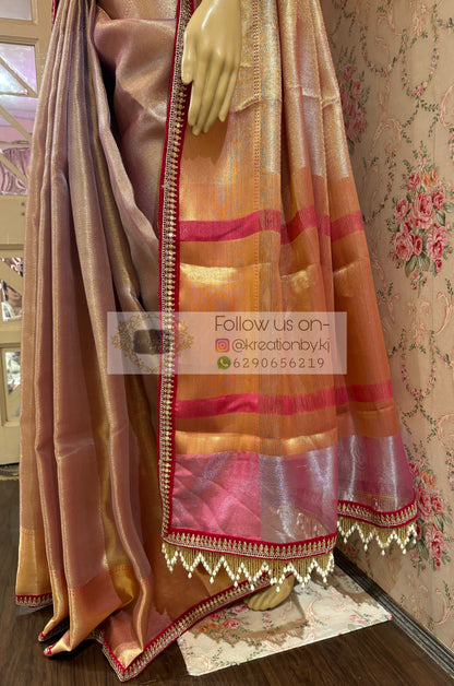 Dusty Pink Tissue Saree with Hand made Tassels in Pallu