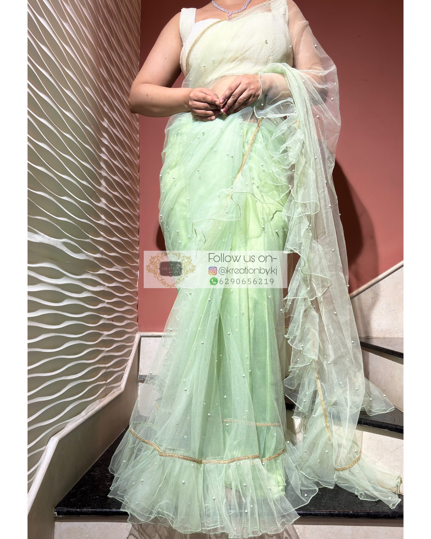 Soft Mint Green Ruffle Net Saree