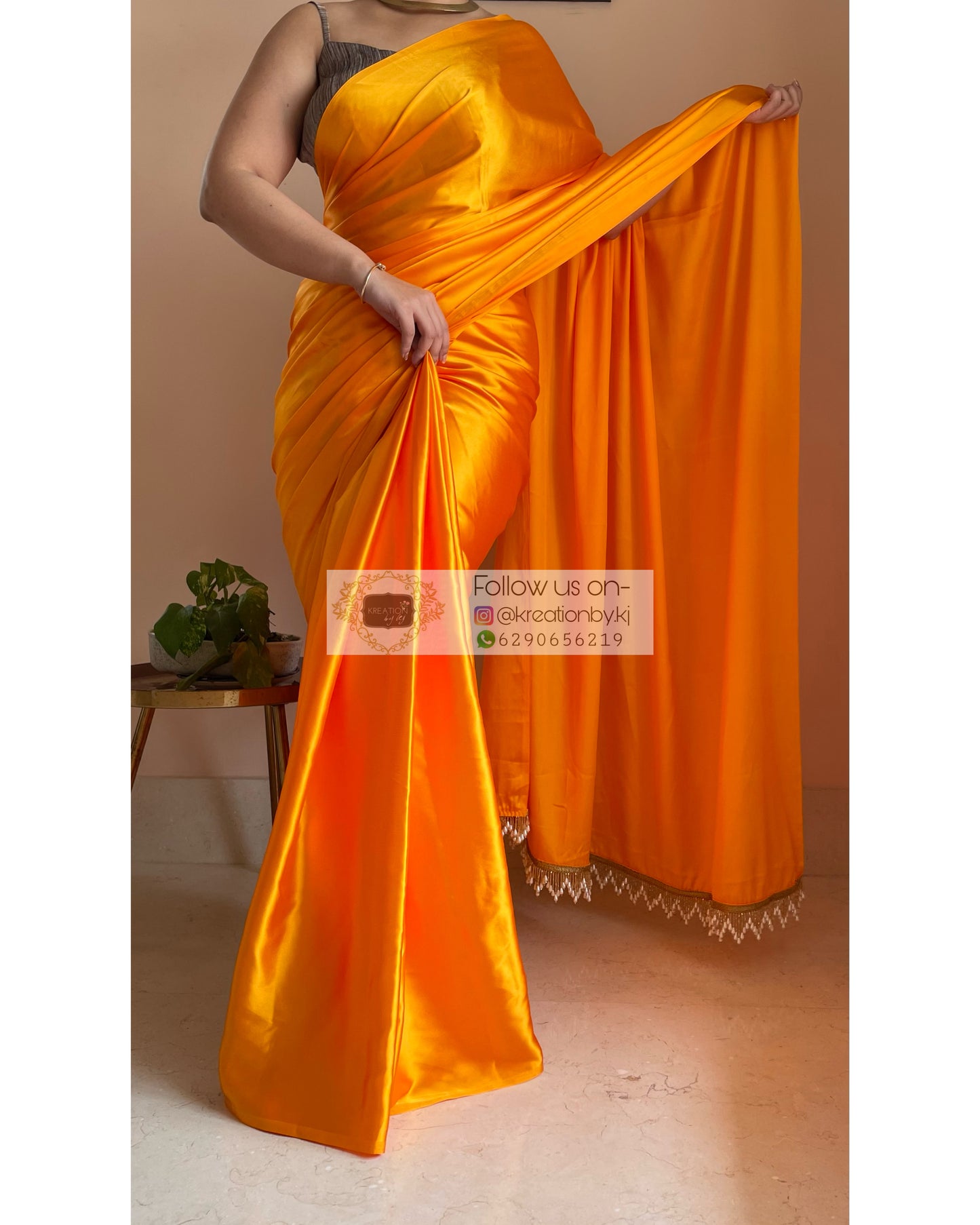 Saffron Satin Silk Saree with Handmade Tassels on Pallu