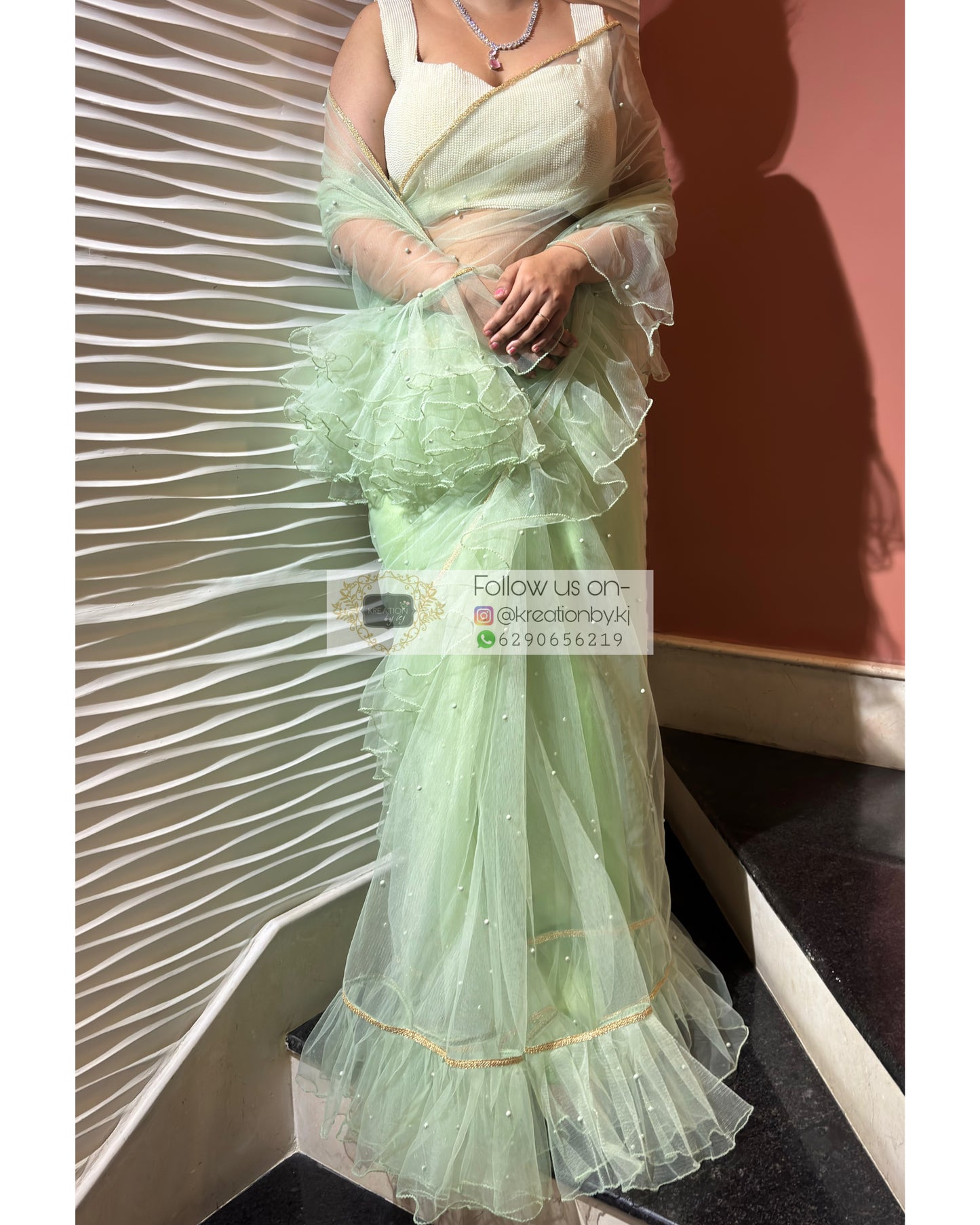Soft Mint Green Ruffle Net Saree