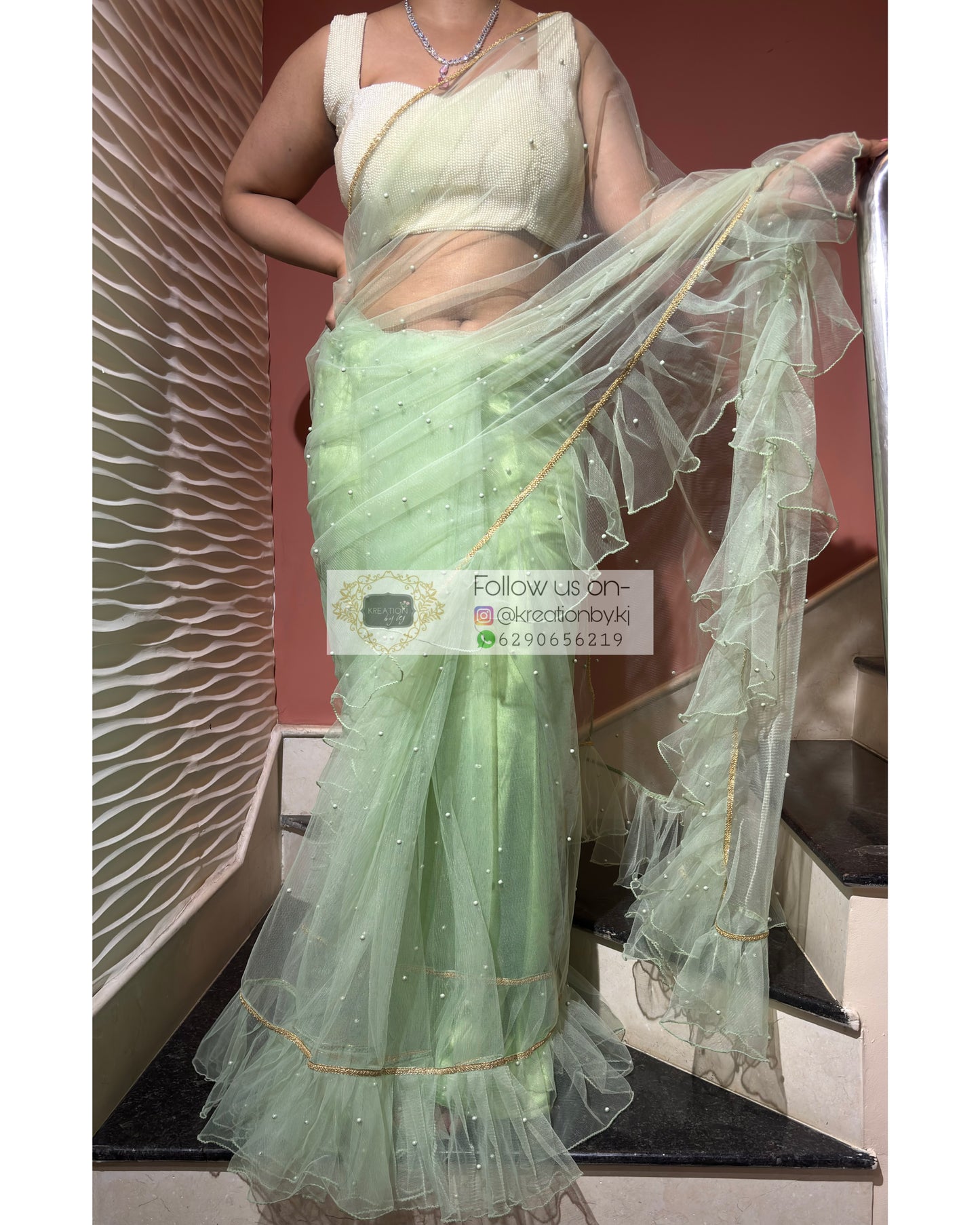 Soft Mint Green Ruffle Net Saree