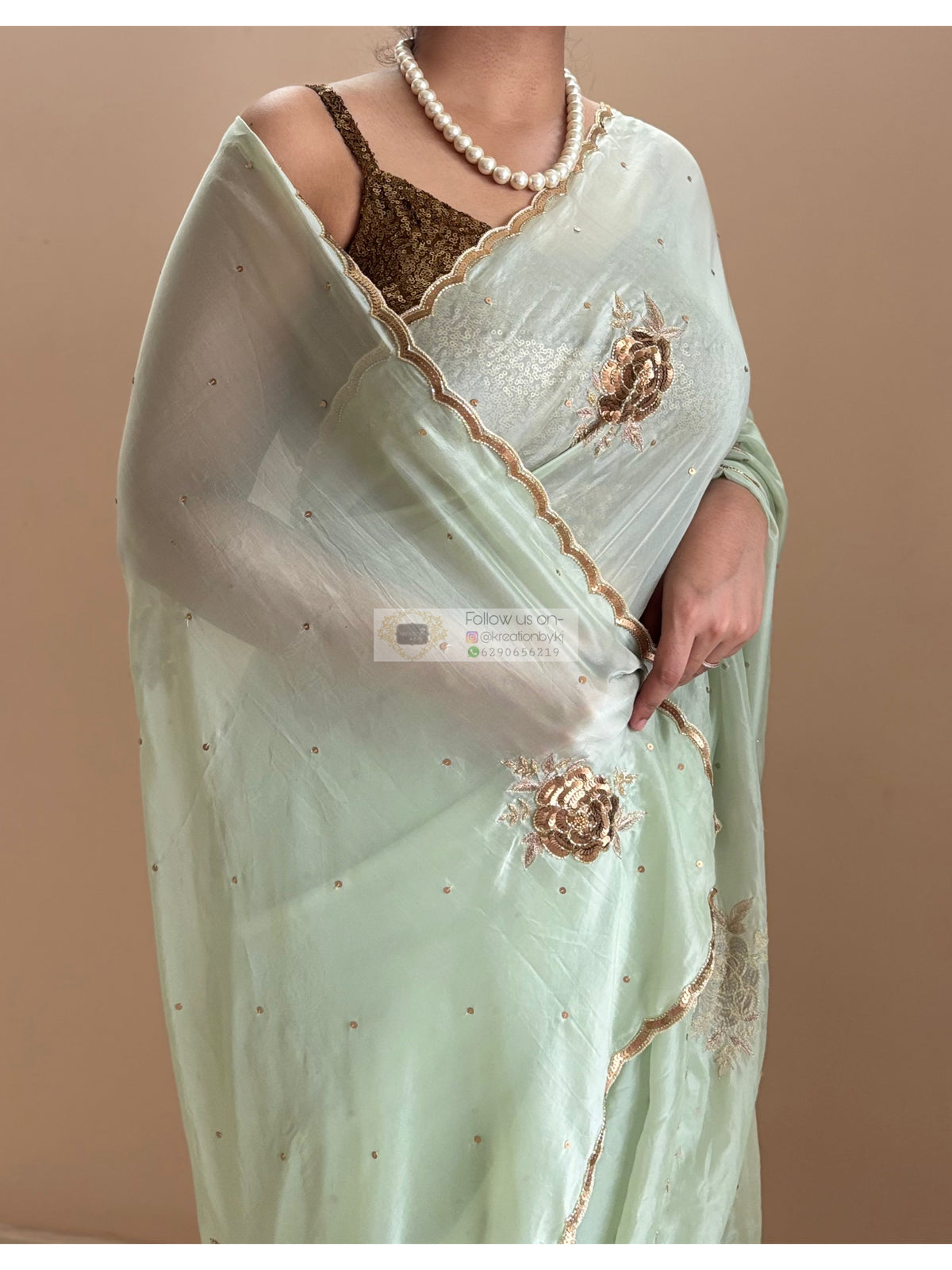 A Moment in Rose In Mint Green Organza Saree