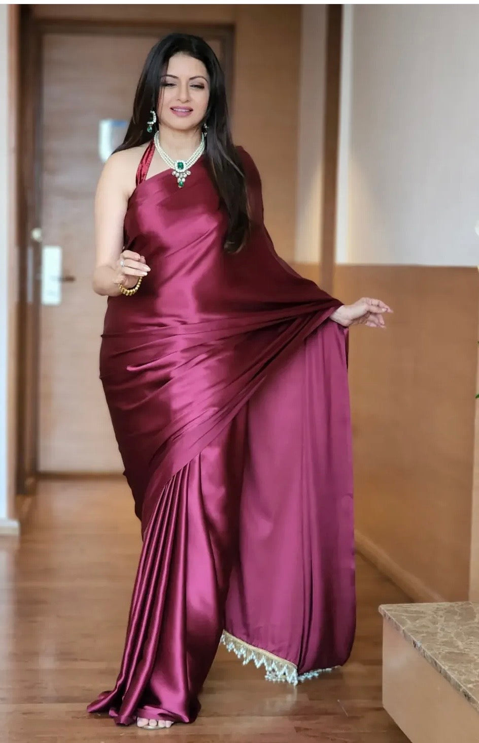 Cherry wine satin silk saree with handmade tassels on pallu