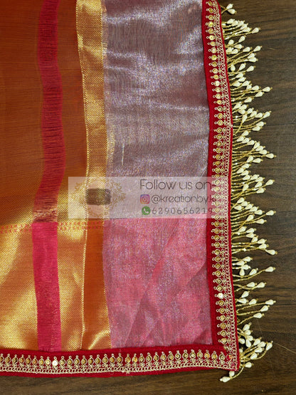 Dusty Pink Tissue Saree with Hand made Tassels in Pallu