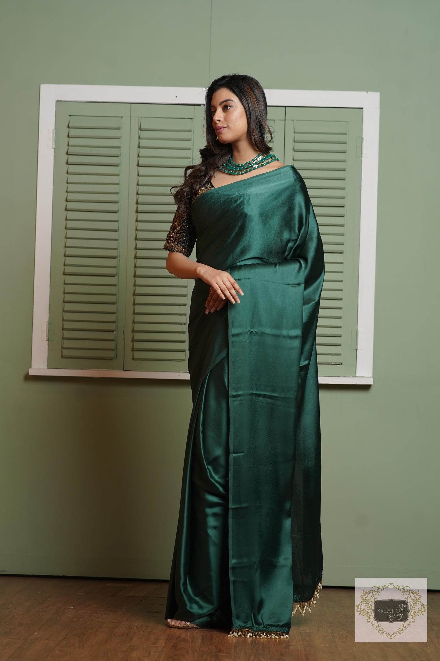 Emerald Green Satin Silk Saree With Handmade Tassels On Pallu