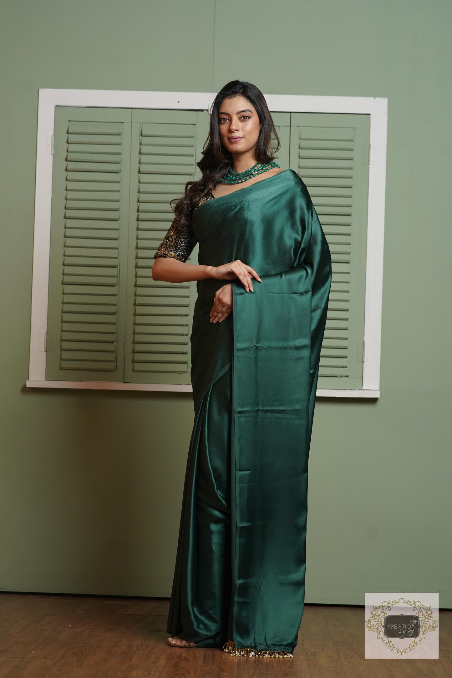 Emerald Green Satin Silk Saree With Handmade Tassels On Pallu