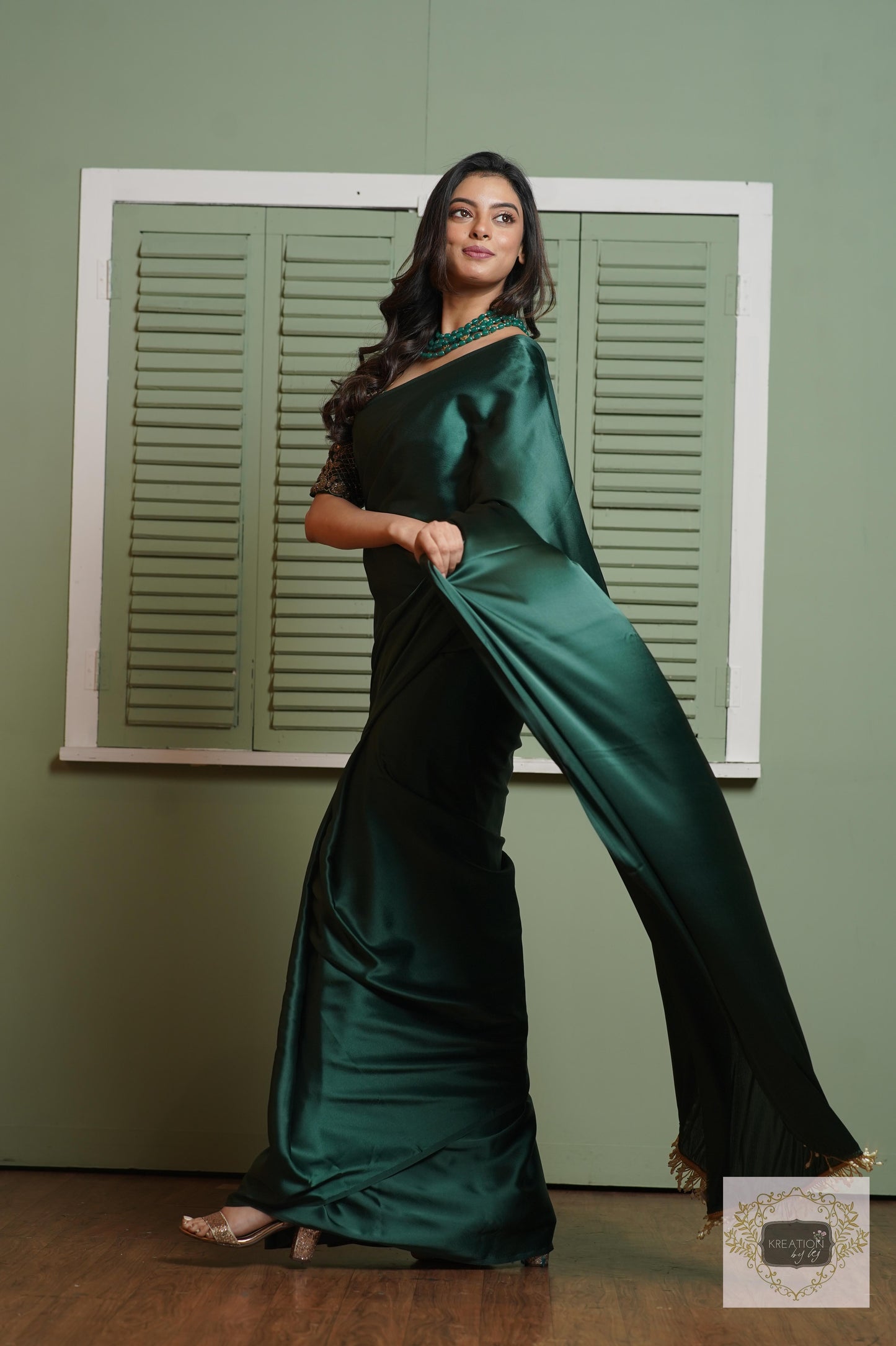 Emerald Green Satin Silk Saree With Handmade Tassels On Pallu