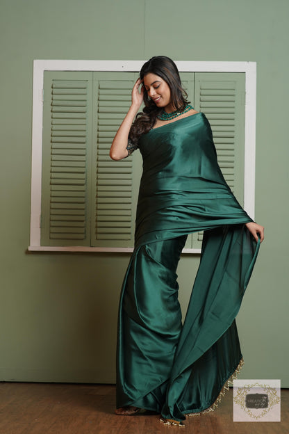 Emerald Green Satin Silk Saree With Handmade Tassels On Pallu