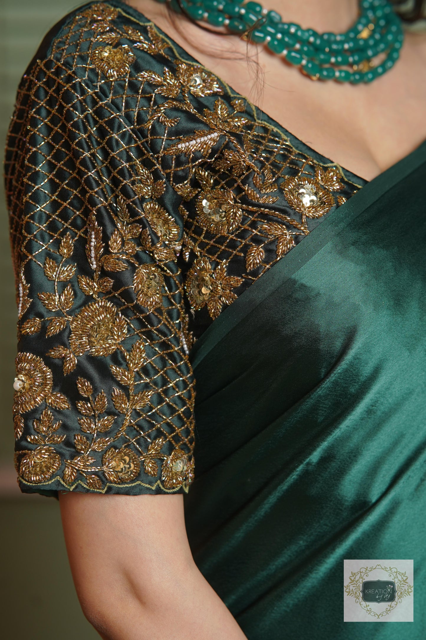 Emerald Green Satin Silk Saree With Handmade Tassels On Pallu