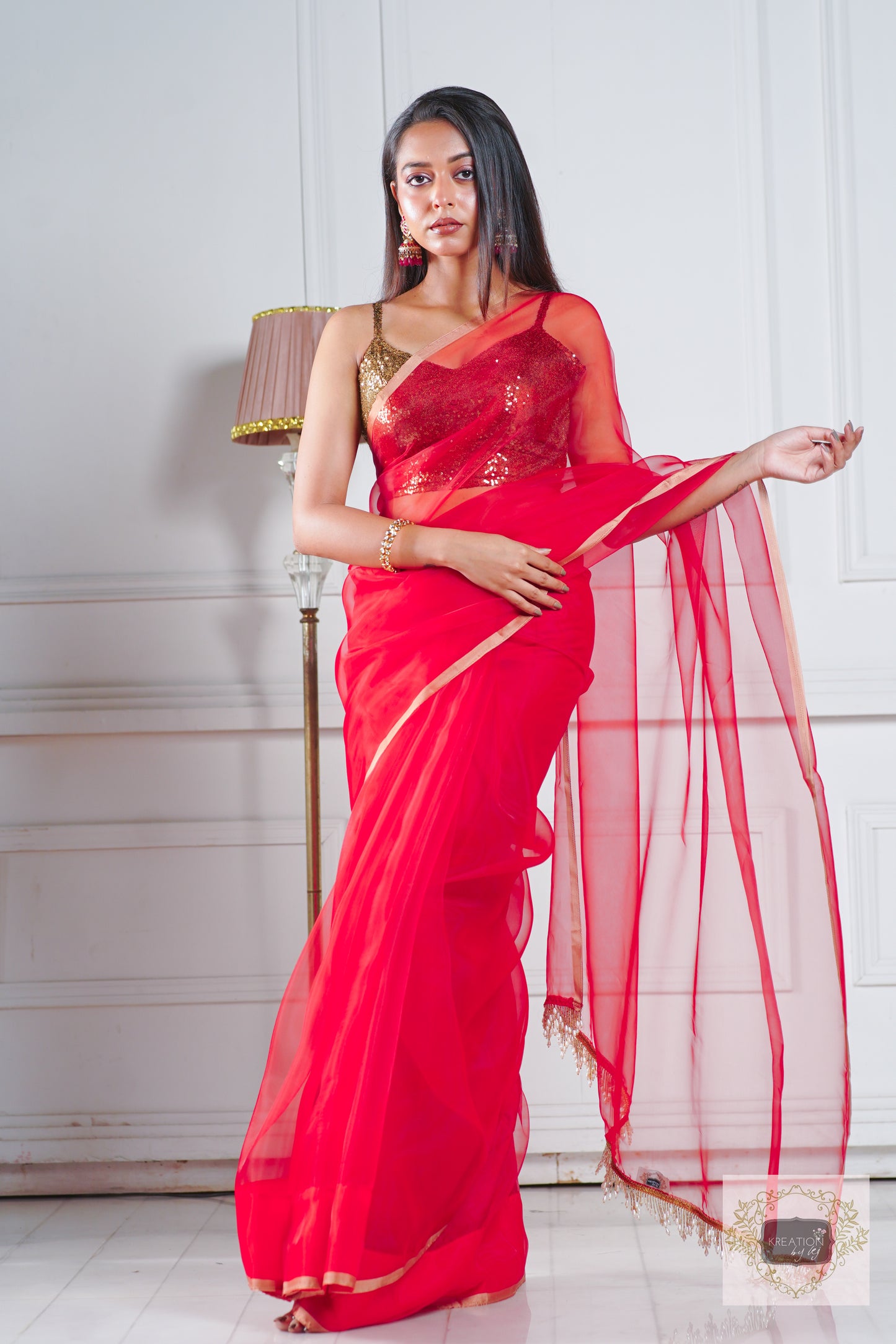 Red Organza Saree With Handmade Tassels On Pallu